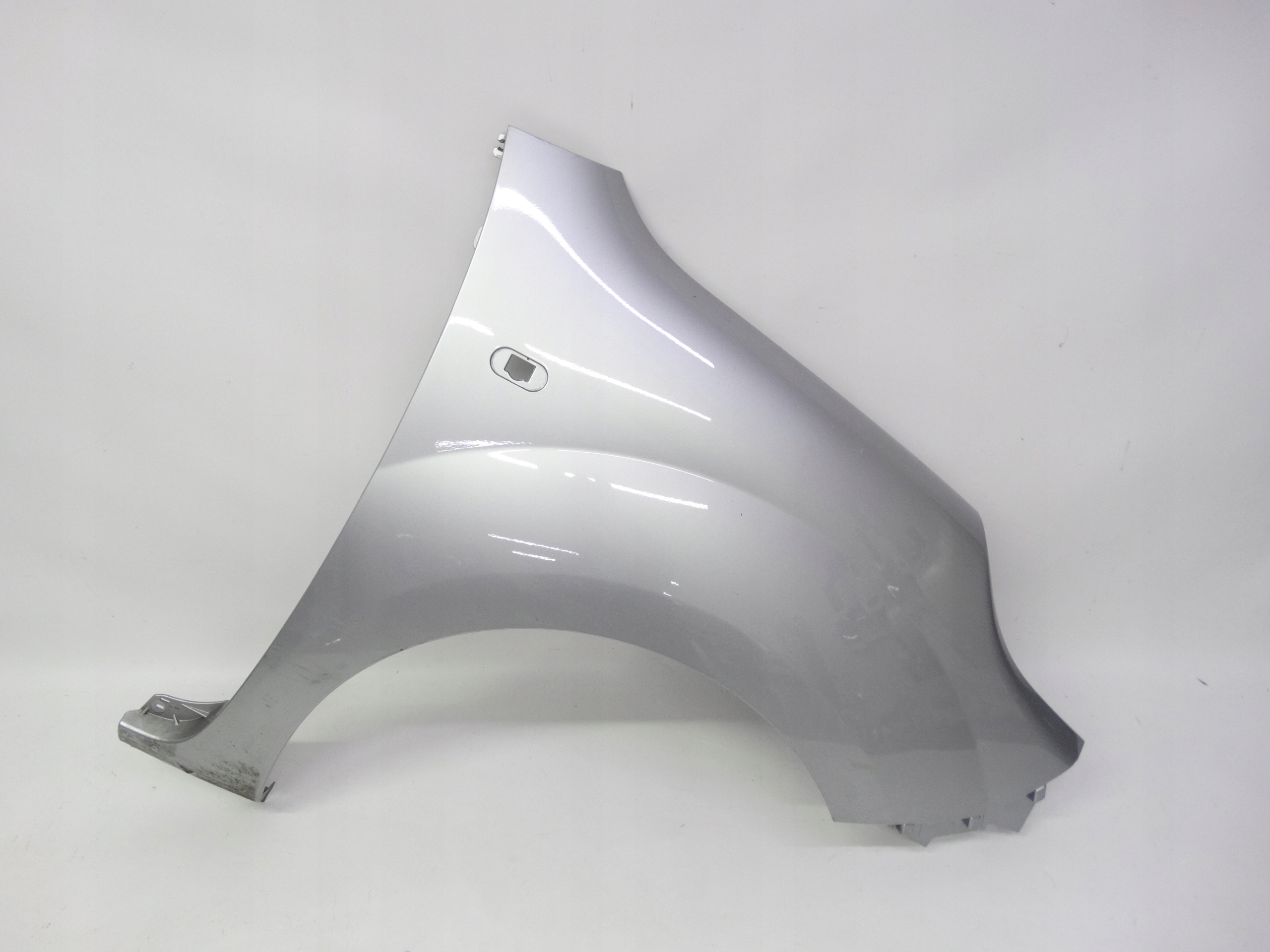 Second image of Renault Kangoo II Lift 2013-2021 błotnik prawy przedni oryginalny