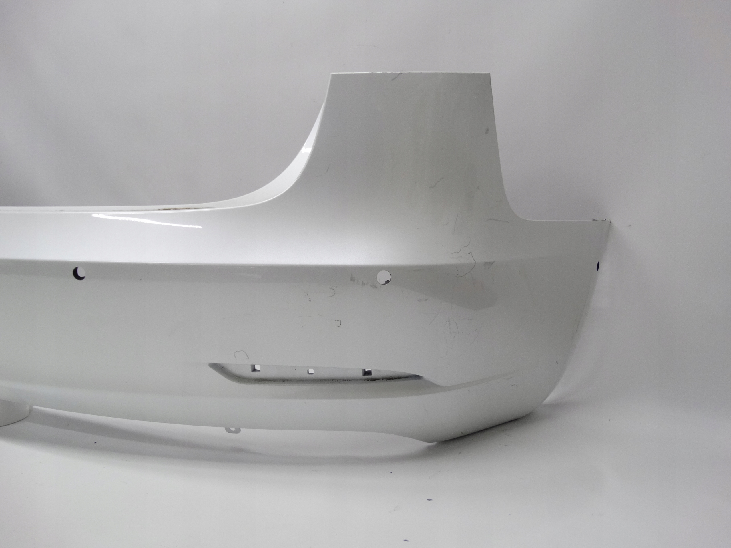 Second image of Tesla Model 3 17-23 zderzak tylny oryginalny 1108905-00-D