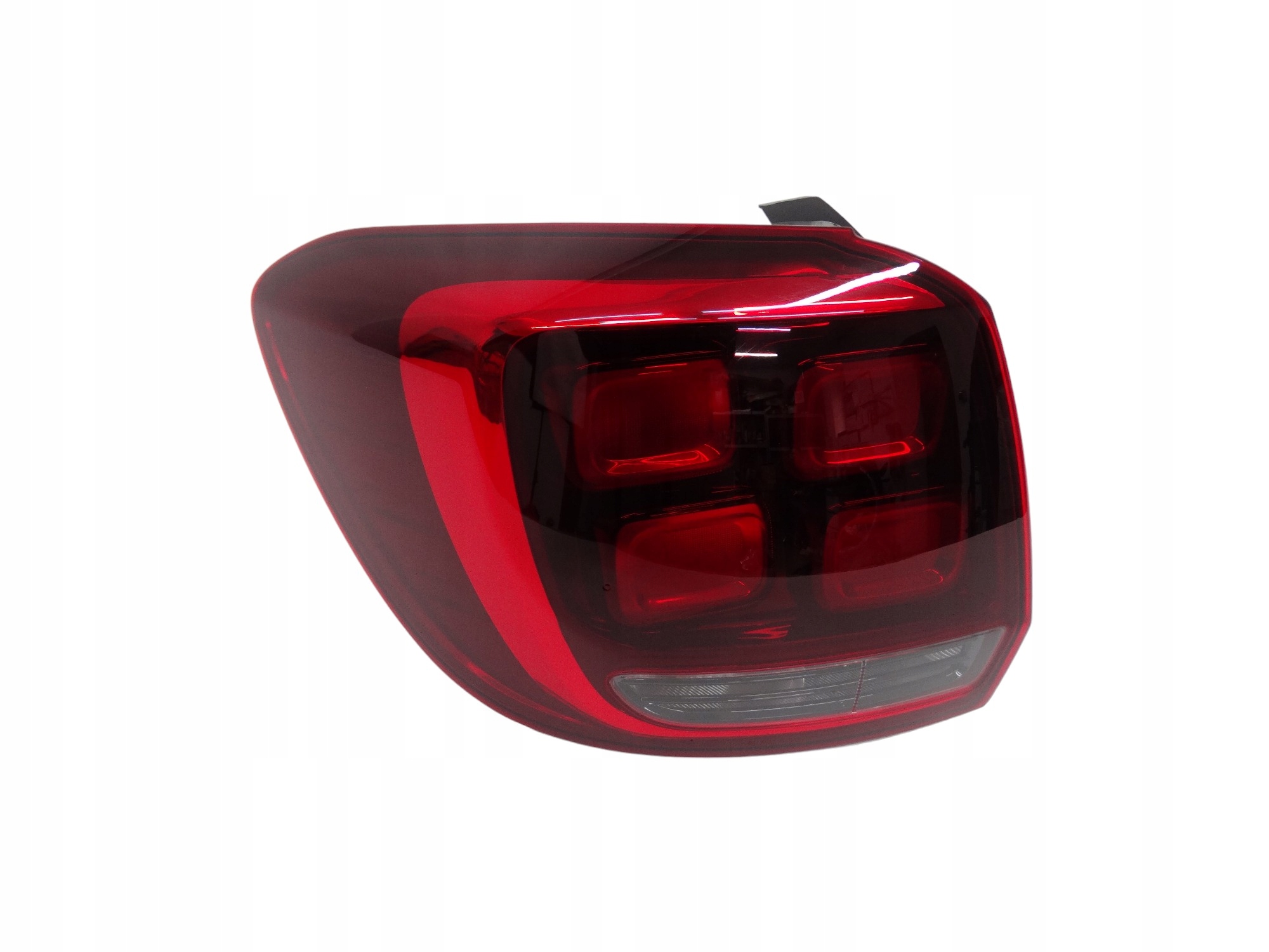 Dacia Sandero II Lift 16-20 lampa tylna lewa w błotnik 265554938R oryginał