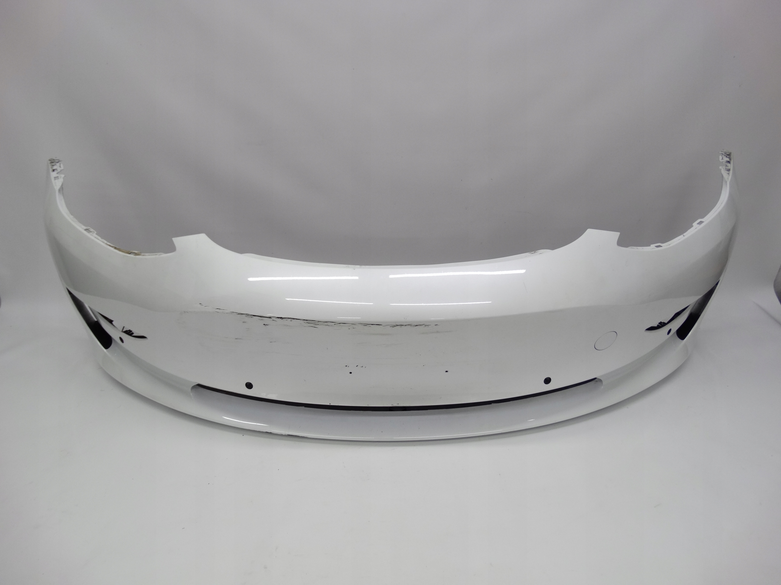 Second image of Tesla Model 3 17-23 zderzak przedni oryginalny 1530702-03-B