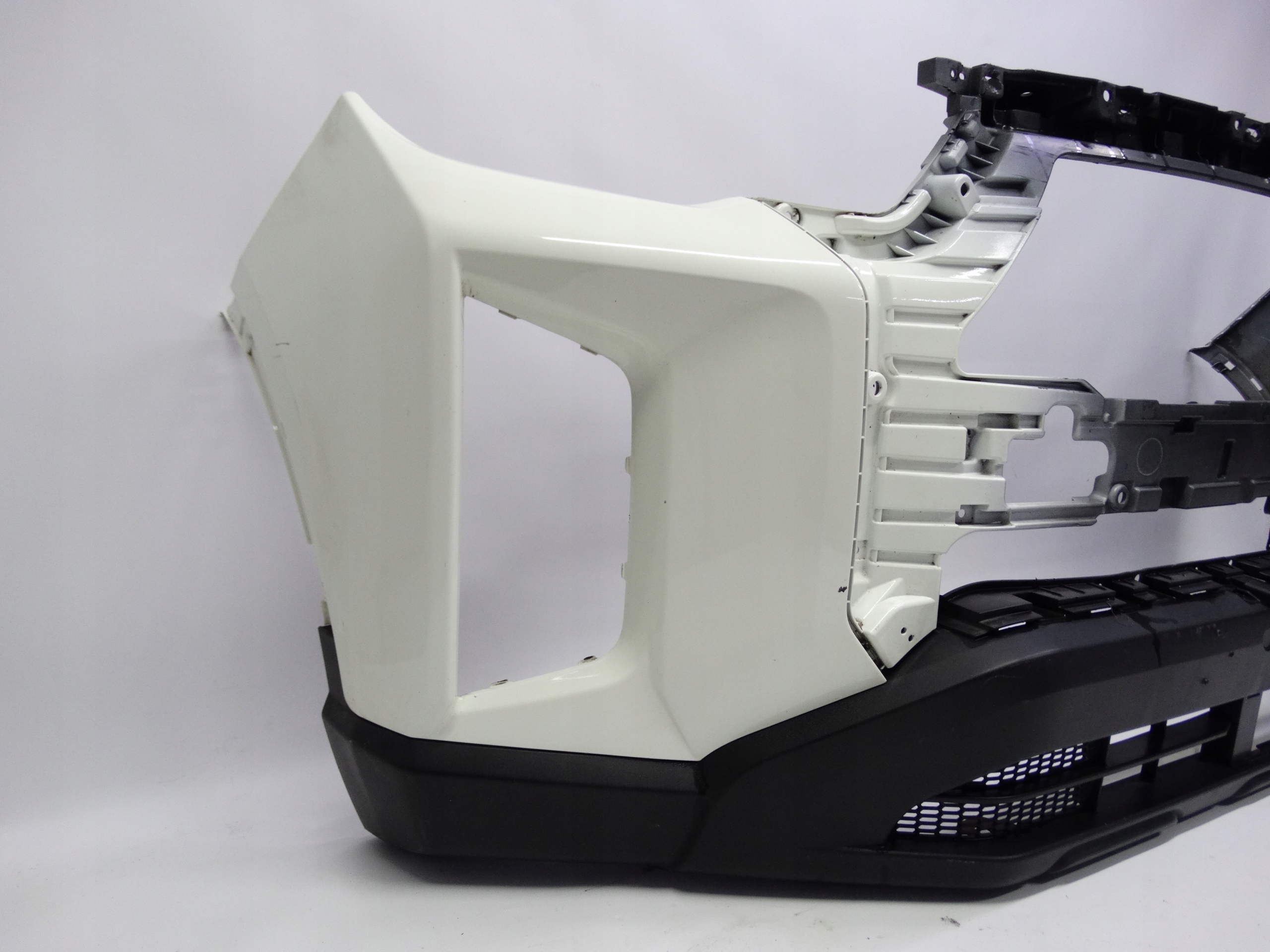 Second image of SsangYong Musso Lift 21- zderzak przedni K78712-38020 oryginalny