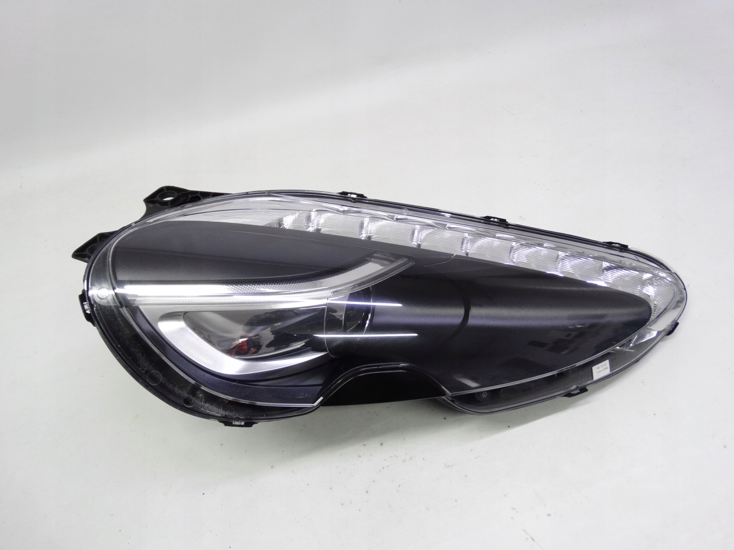 Second image of Aston Martin DB9 Lift Rapide Virage lampa prawa Bi-Xenon AD43-13W029-BE