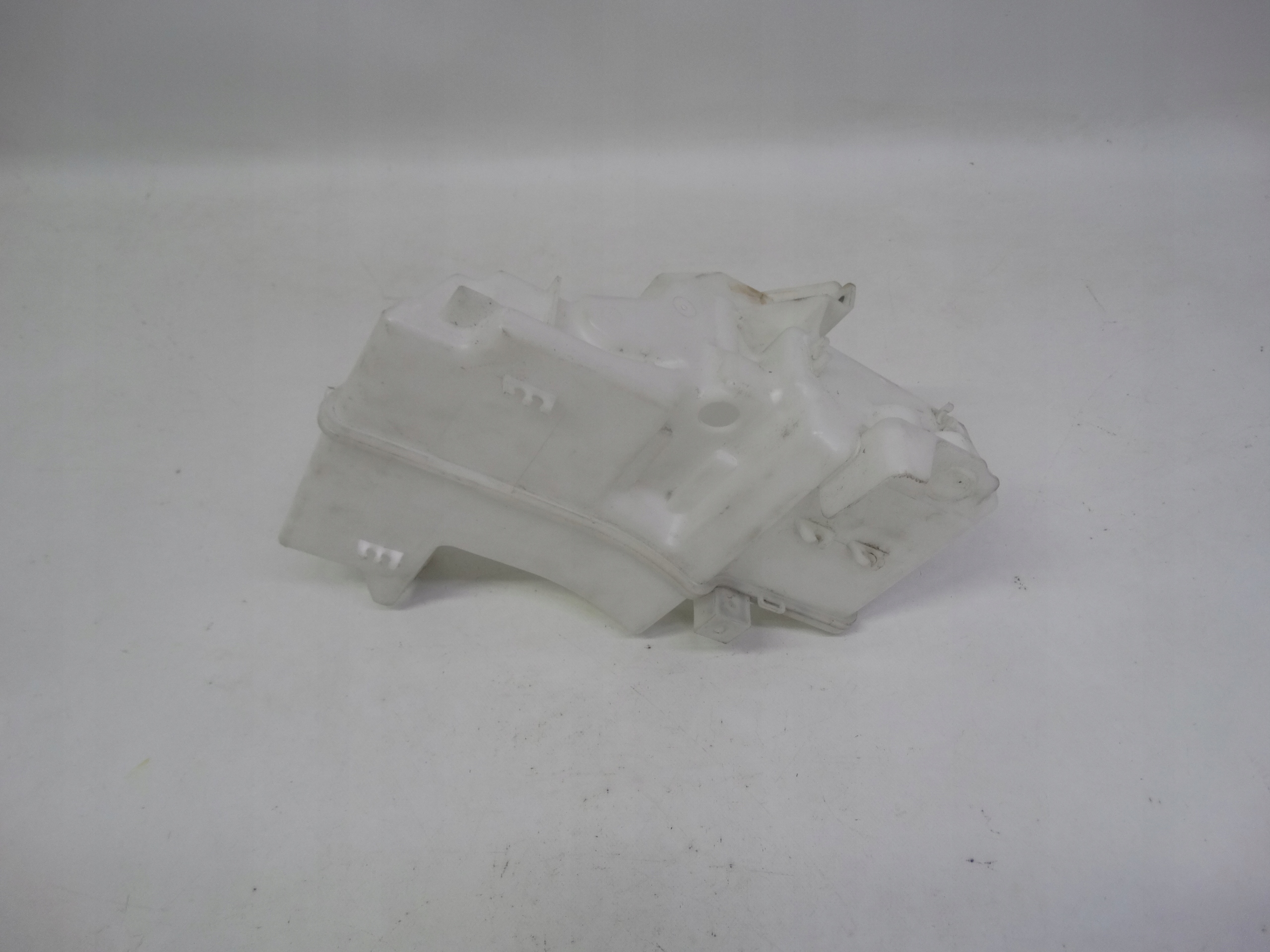 Second image of Toyota Corolla E21 18- zbiornik spryskiwaczy 85310-02710 oryginalny