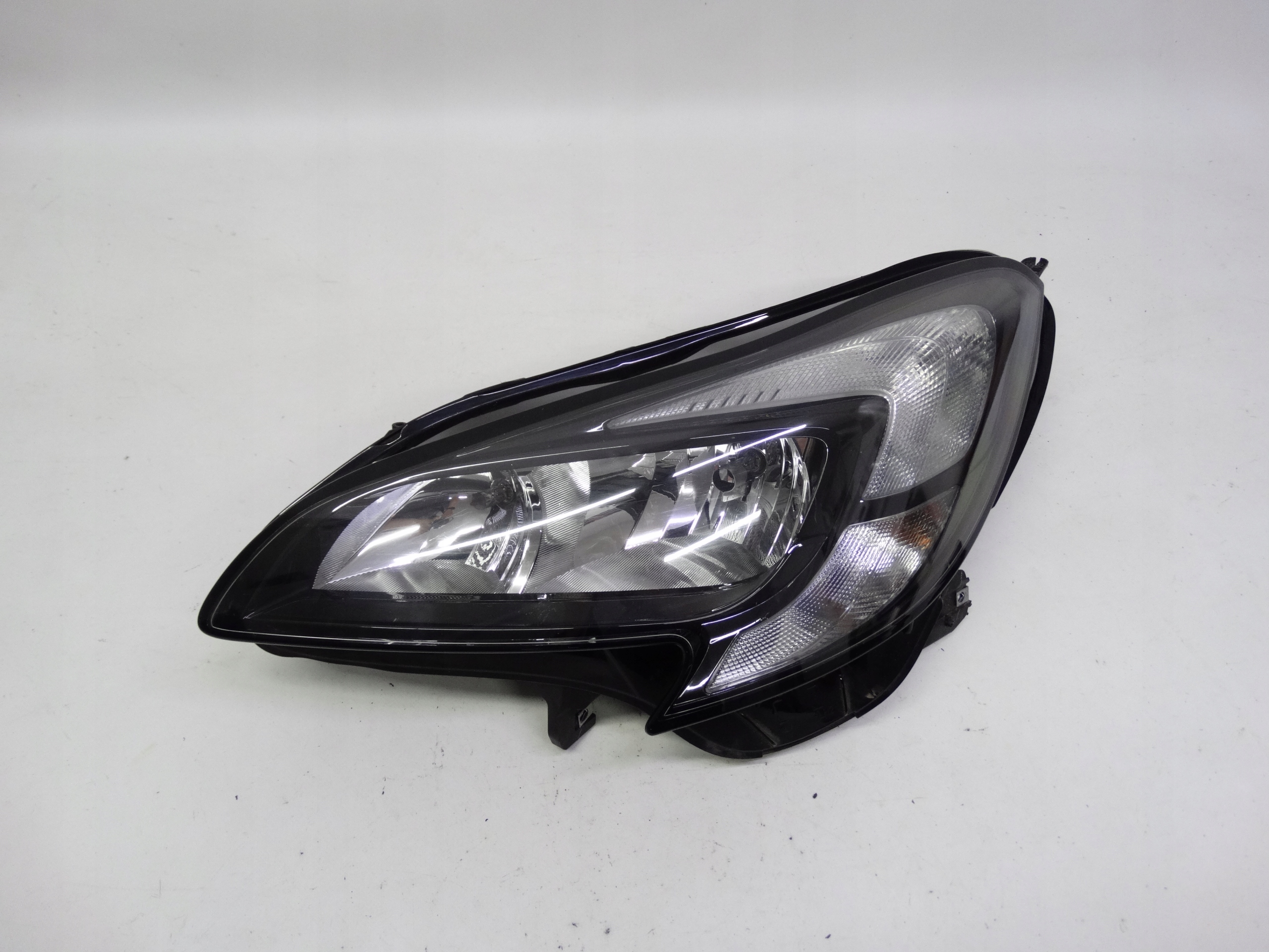 Second image of Opel Corsa E 2014-2019 lampa lewa zwykła bez LED 13381335 oryginalna
