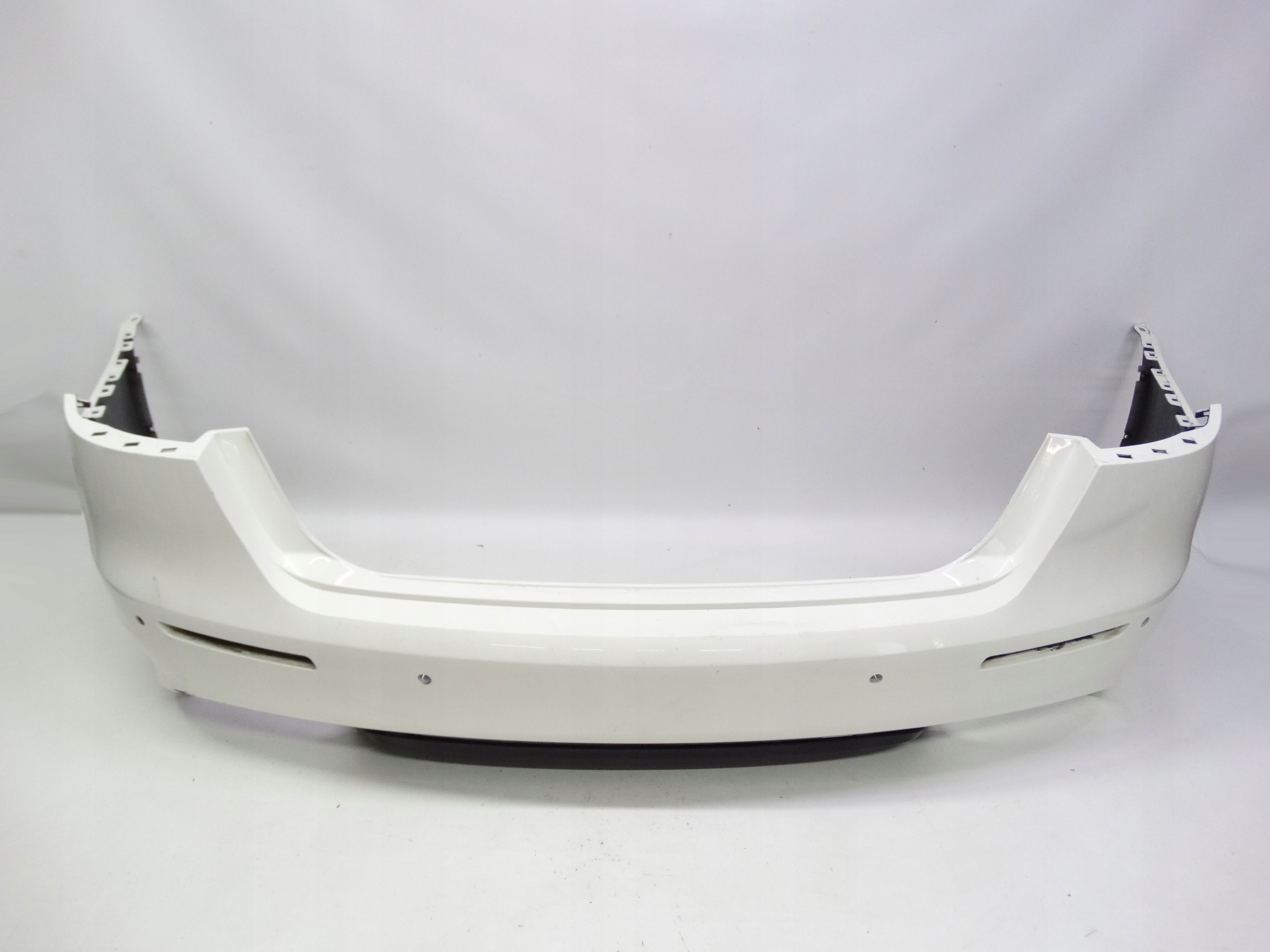 Second image of Maserati Quattroporte VI lift 2016-2024 zderzak tylny oryginalny 670038134