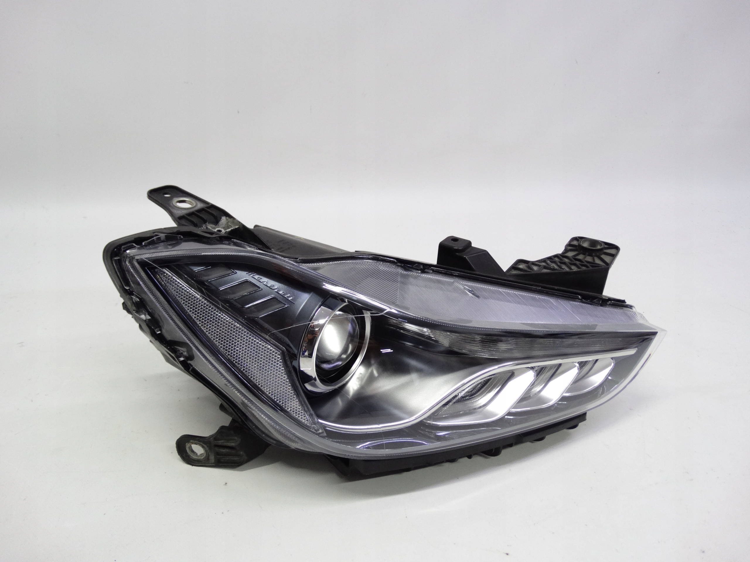 Second image of Maserati Ghibli III 13-17 lampa prawa Xenon skrętny oryginalna 670004658