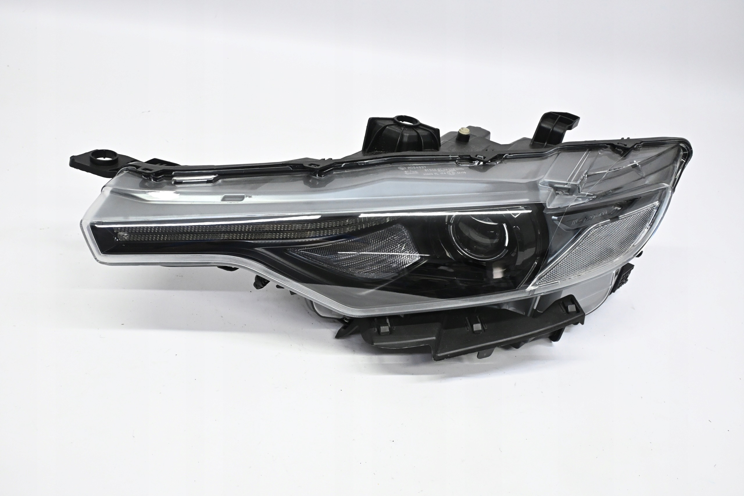 Second image of Maserati Levante M161 2017-2024 lampa lewa Xenon skrętny 670034641 oryginał